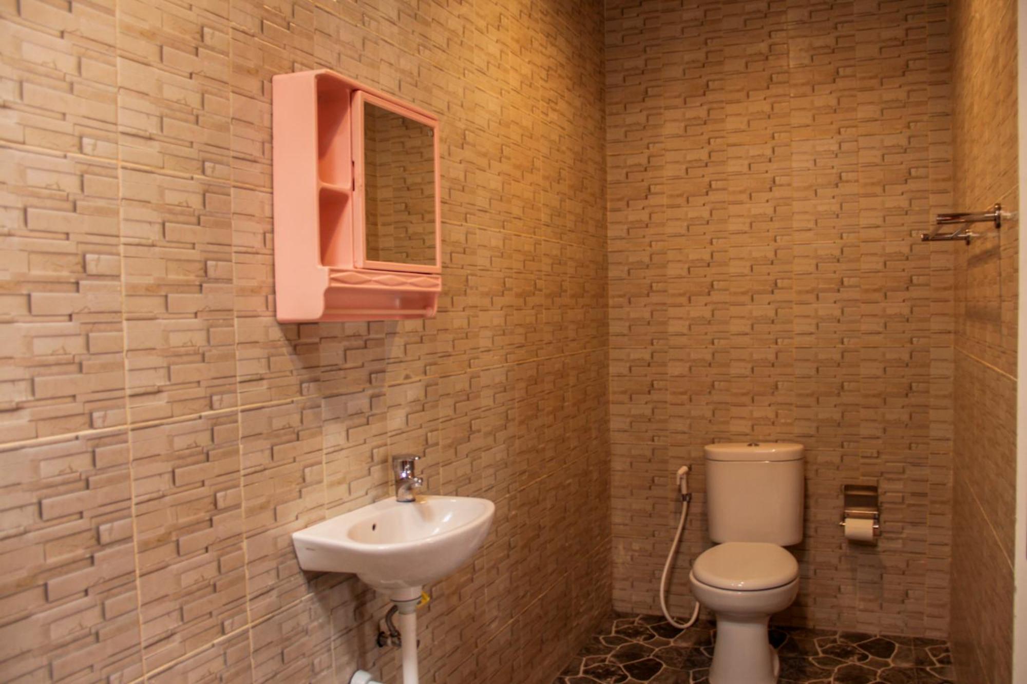 Nyoman Guesthouse Canggu Rum bild