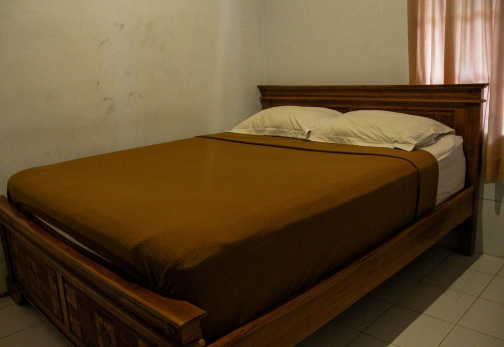 Nyoman Guesthouse Canggu Rum bild